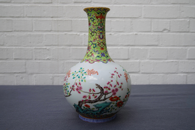 A Chinese famille rose bottle vase with floral design, Jiaqing mark, 19/20th C.